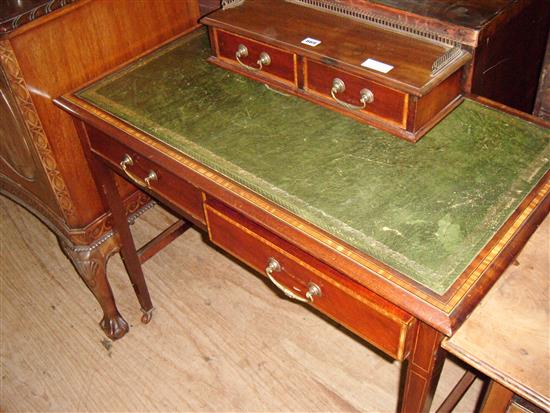 Edwardian desk with brass gallery on drawers